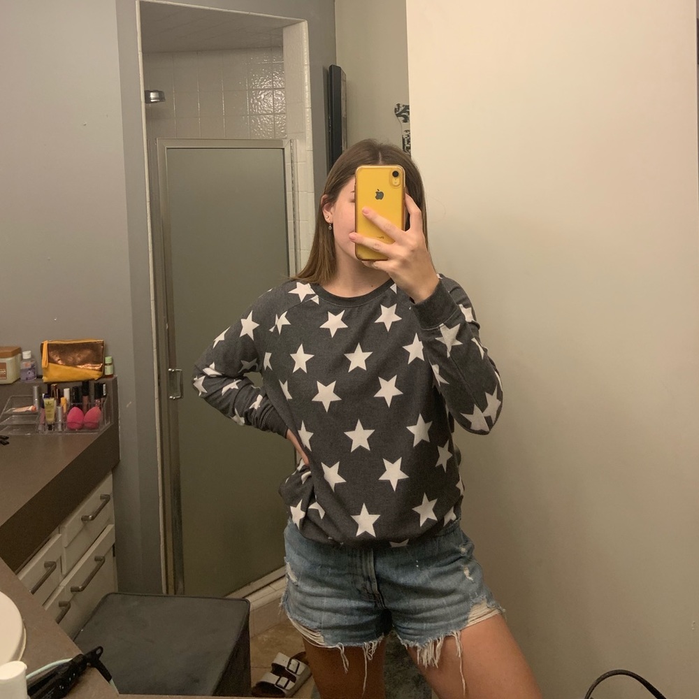 Dark grey and white start sweater